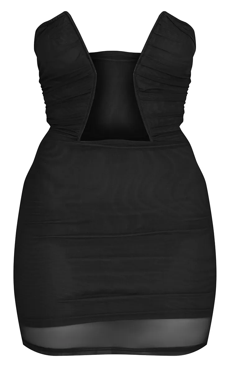 Petite Robe en mesh noir ouverte sur le buste