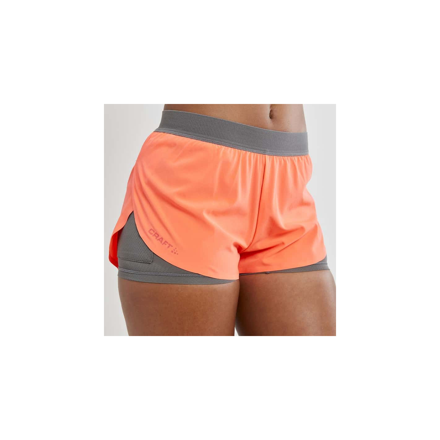 Short Running CRAFT Femme Vent 2-in-1 Racing Corail PE 2020