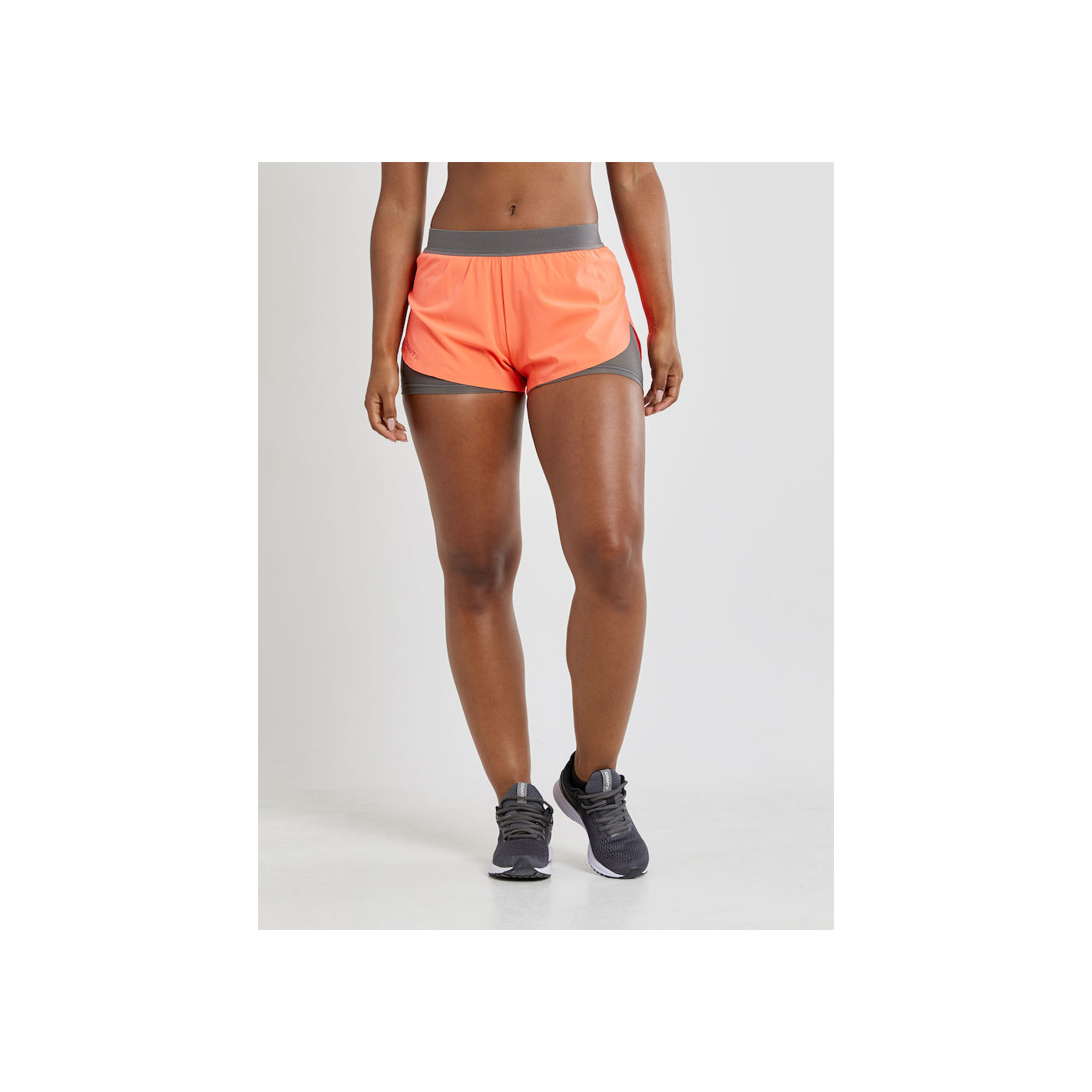 Short Running CRAFT Femme Vent 2-in-1 Racing Corail PE 2020